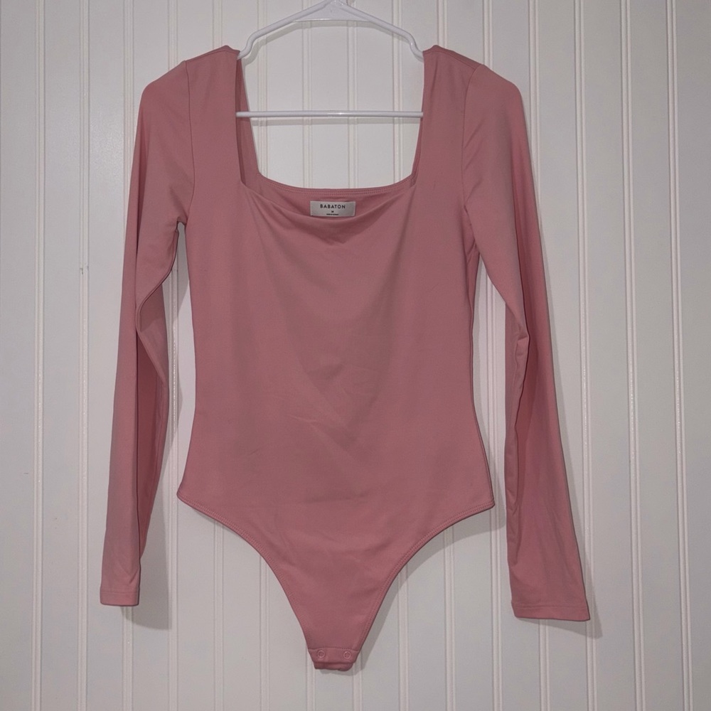 Aritzia Babaton size medium baby pink long sleeve bodysuit